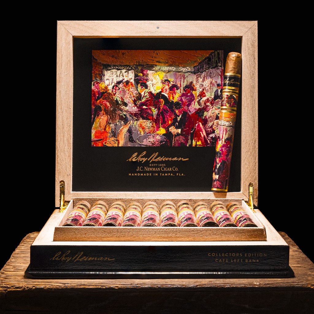 J.C. Newman and the LeRoy Neiman Foundation unveil the 2024 Collector’s Edition cigars, honoring LeRoy Neiman. All profits support arts education in public schools. Featuring the “Left Bank Café” for the 2024 Paris Olympics, each cabinet includes a lithograph &amp; a surprise print.