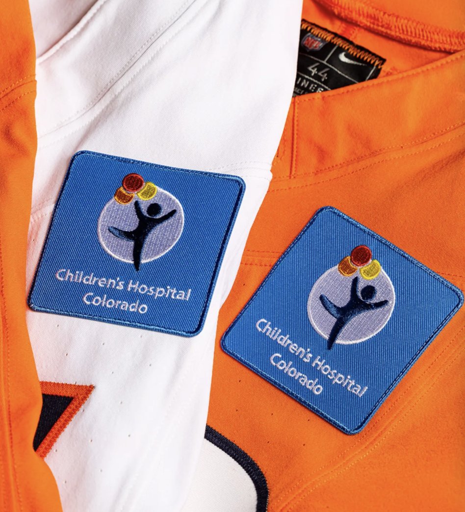 ZacStevens's tweet photo. Really cool: The Broncos will have a Children's Hospital Colorado path on their practice jerseys, beginning immediately as part of their renewed partnership with the organization.

It's the only pediatric hospital to have a jersey patch in the NFL, NHL, NBA or MLB.

(📸@Broncos) https://t.co/Hb4CqbNxYt