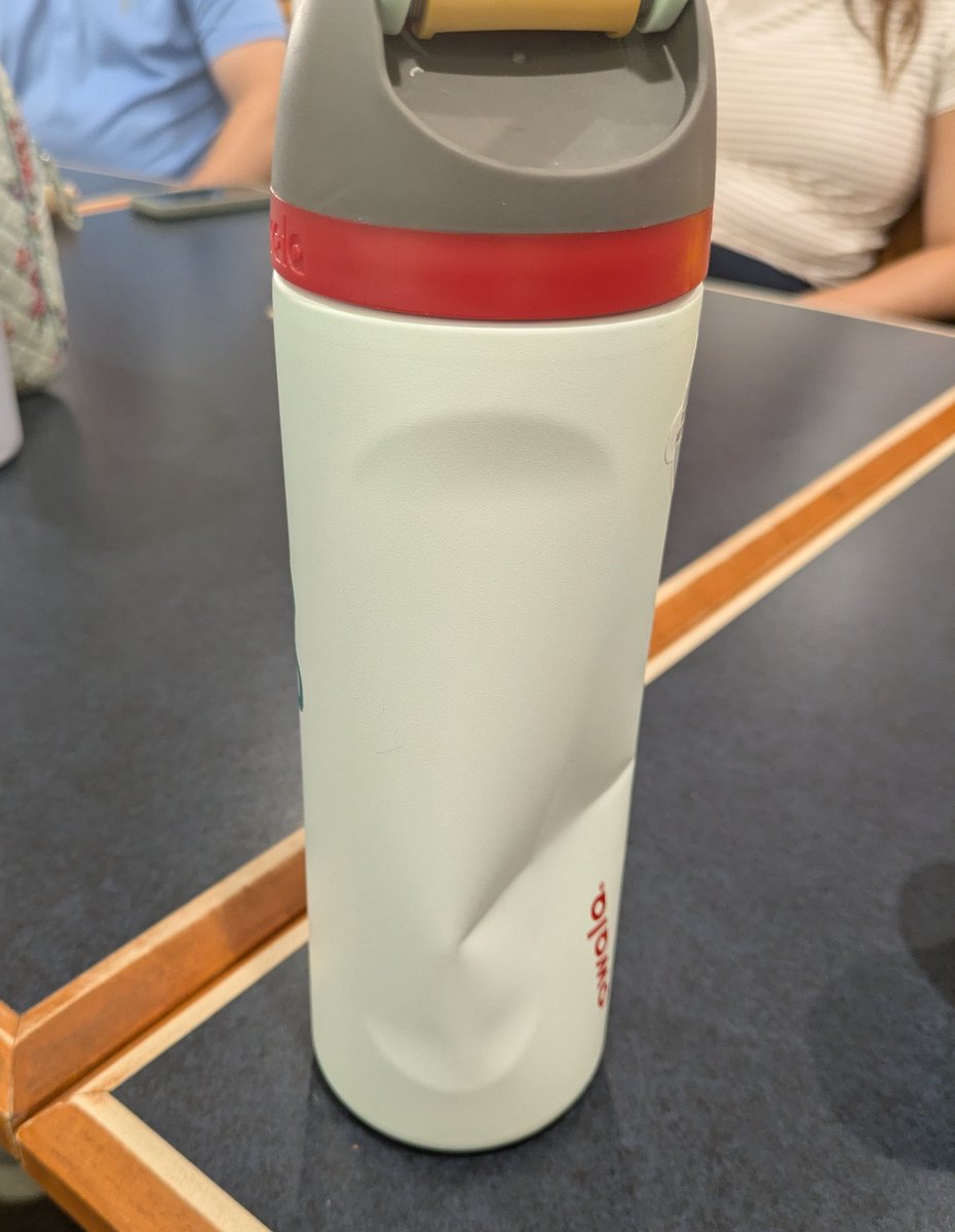 Megan_Diesslin's tweet photo. If you've ever questioned the durability of @Marcus_Theatres seats, they took out my @owalalife water bottle like it was nothing. https://t.co/pxpvcGHIXr