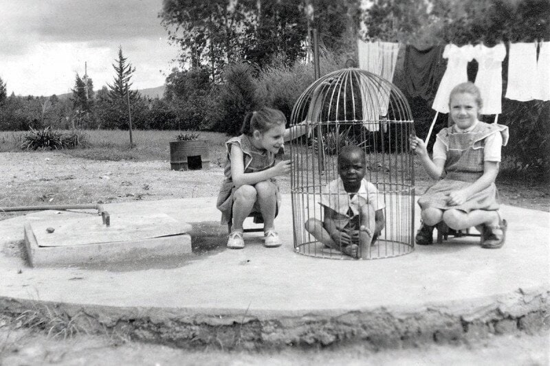 dionysius_80's tweet photo. A child in a birdcage, 1955. https://t.co/8gvPCUiiOu