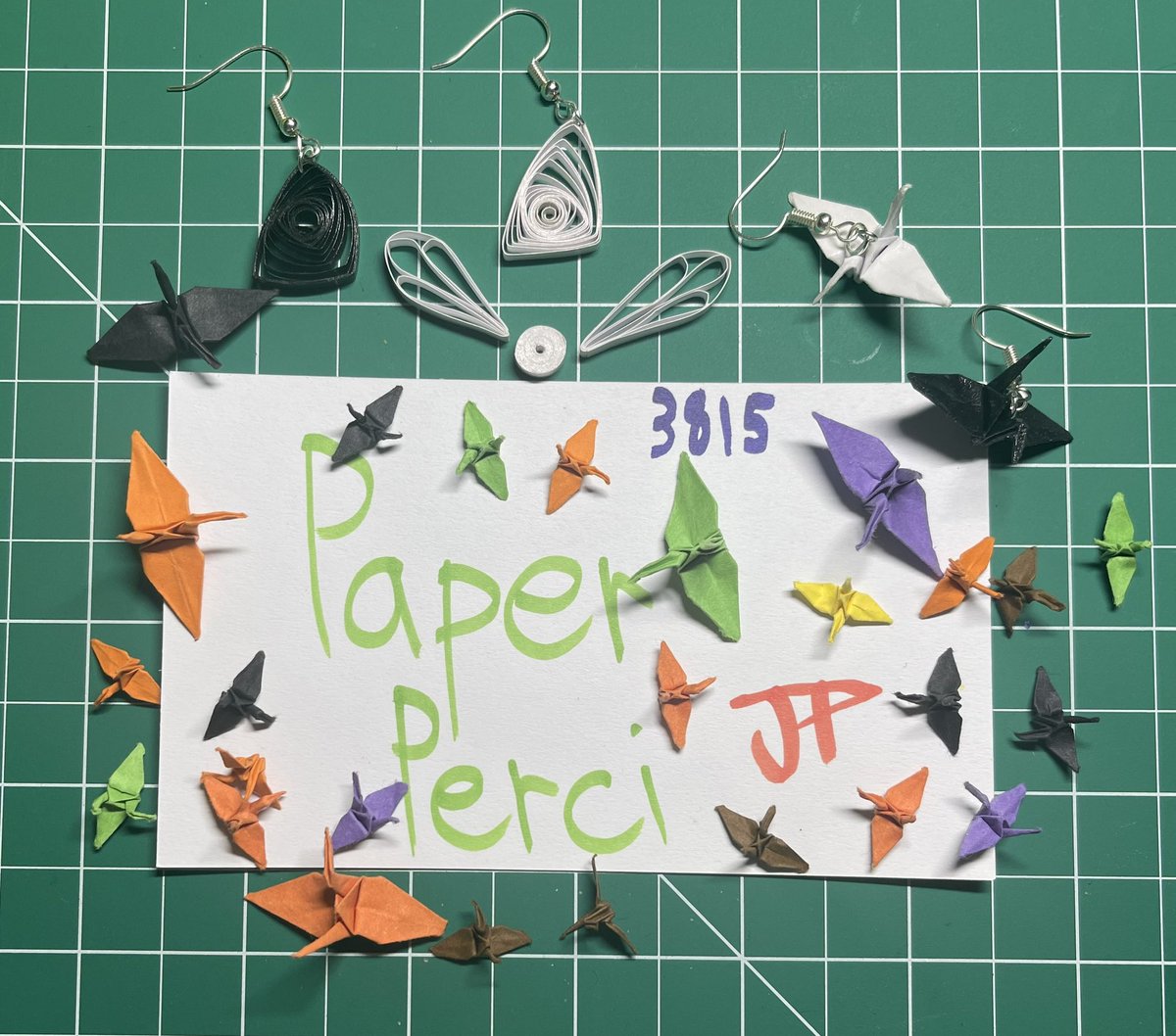 PaperPerci's tweet image. Figuring out earring stuff and also trying out quilling #origami #crane #earrings #quilling