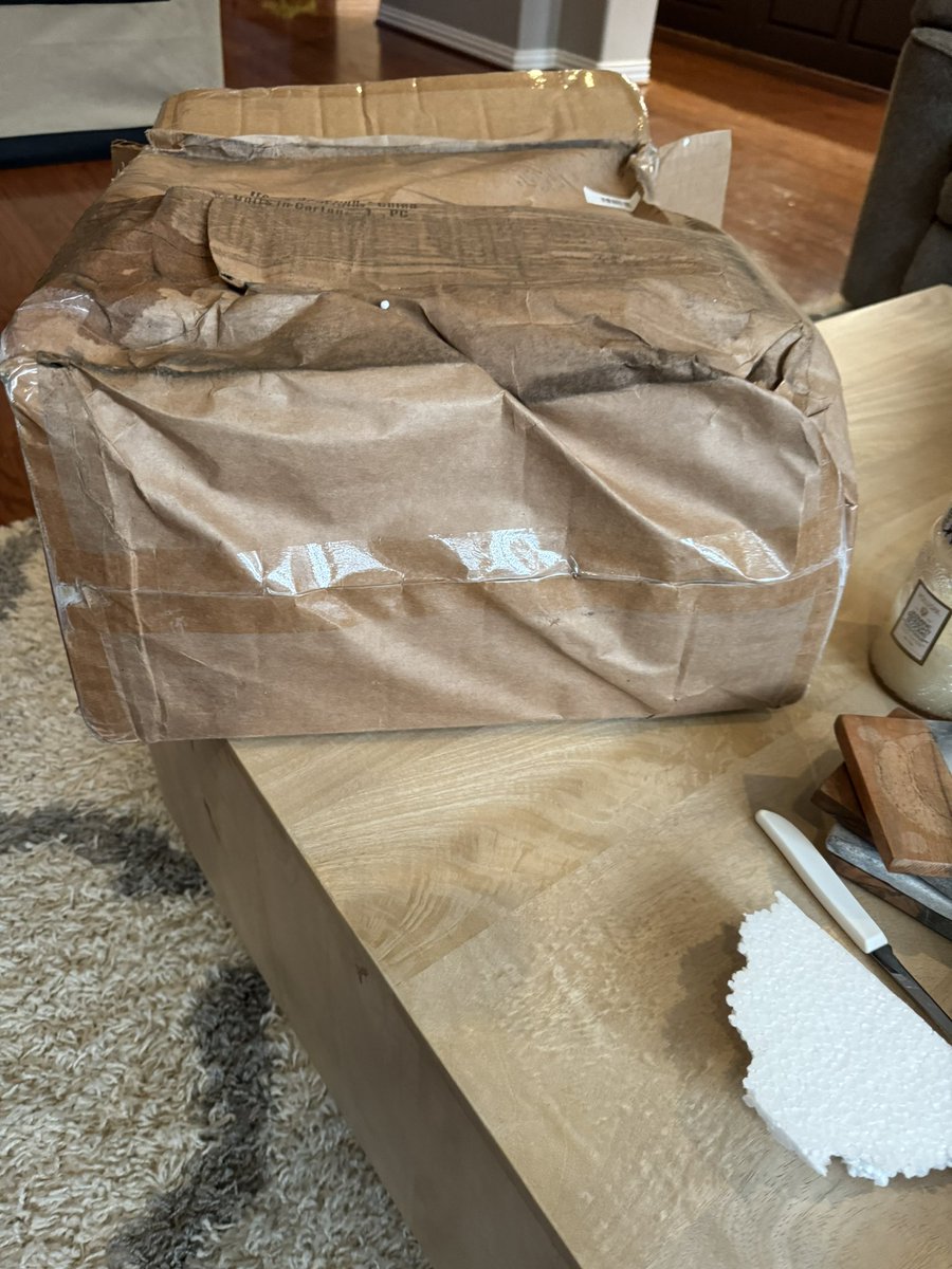 libbyshims's tweet photo. @UPS 
This is my parcel that was delivered today- crushed and wet.  Driver obvi knew the poor condition and took the pic from the truck instead of close up on porch like always.  You’re becoming USPS- do better. https://t.co/keEJXKB26i