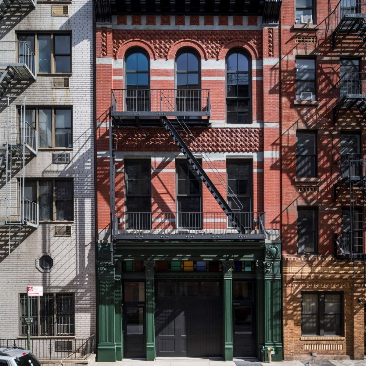 NYSERDA's tweet photo. 🚧 Summer of Shovels: Showcasing projects making strides toward a cleaner, greener NYS. Our NYSERDA team celebrated the 🎀 ✂️ of Engine 16 in NYC. This round 1 #BuildingsofExcellence winner transformed an old firehouse into clean multifamily housing. #SummerofShovels https://t.co/gBqucvy1z9