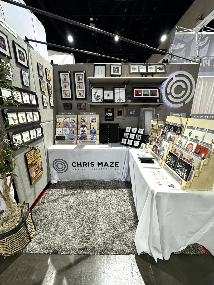 MAZEhimself's tweet photo. Booth is all set up and ready to go! Looking forward to seeing all of you at #SDCC! Remember, I’m at Dial R Studios, booth 2103, directly underneath the red Independent Press Pavilion banner. https://t.co/6QXxt58MwP