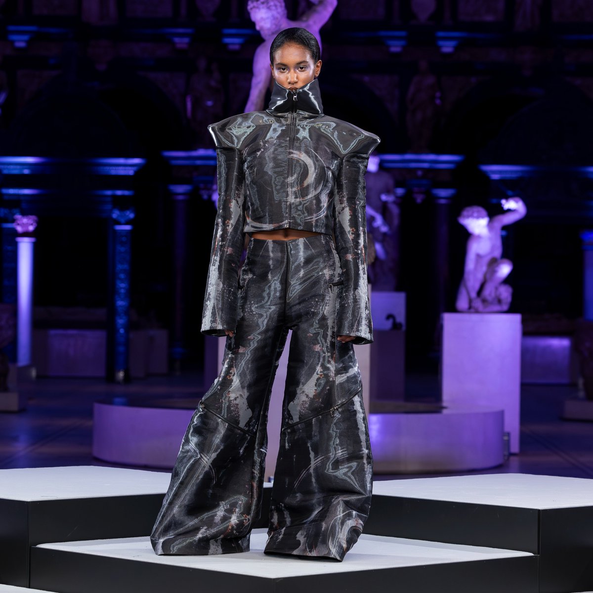 HongKongPolyU's tweet photo. Established by The Hong Kong Polytechnic University and the Royal College of Art, the Laboratory for Artificial Intelligence in Design (#AiDLab) is the first research platform dedicated to integrating AI with design. Recently, AiDLab extended its vision to the United Kingdom. 🇬🇧 The ‘Kan Tai Keung X AiDLab X Hong Kong Fashion Designers Show,’ organised by AiDLab and sponsored by the Culture and Creative Industries Development Agency of the HKSAR Government, was held on July 17th at the @V_and_A in London. This event seamlessly combined culture, design, and AI into a single, remarkable showcase. 👏🏼
The show featured the works of renowned artist and ink painter Dr. Kan Tai Keung, along with five esteemed Hong Kong fashion designers: Derek Chan, Wilson Choi, Tak Lee, Sophia XinLi, and Aries Sin. Each designer presented collections crafted with the aid of AI, highlighting the fusion of technology and artistic expression. The event showcased Hong Kong’s dedication to creative excellence and technological innovation, providing a platform for artists and designers to explore the limitless possibilities of AI in fashion design. ✨
#PolyU #PolyUInnovation #FashionShow #FashionDesign #Fashion #AI #ArtificialIntelligence #Technology #CultureXAI