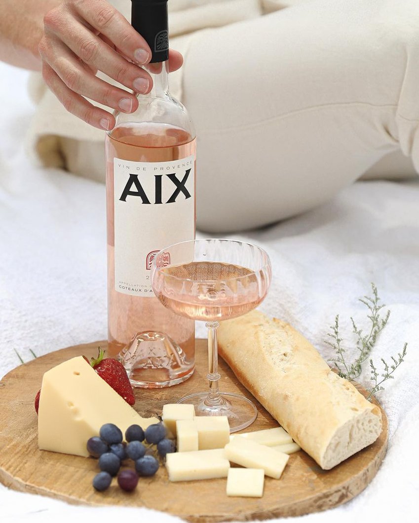 Cheers to National Cheese &amp; Wine Day!  🧀 🍇 Let's celebrate by indulging in a perfect pairing of cheese and a glass of Provence rosé!