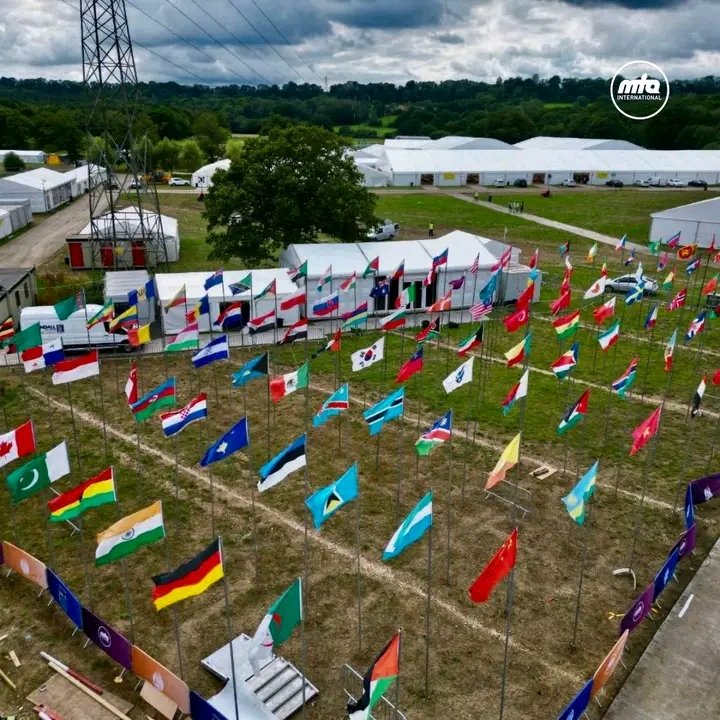 ApooyinAroqeeb's tweet photo. The flags from around the world are up as the Jalsa site comes together! It won’t be long now until we unite under the banner of Khilafat for

 #JalsaUK2024! 🌍✨
 #JalsaConnect https://t.co/CF0y77EQBb