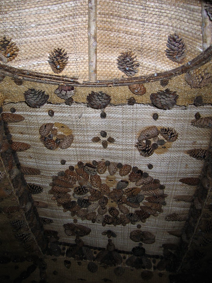 Killerton #Devon 
The Bear Hut (Grade II*). Interesting and eccentric early-C19 'picturesque' building. Includes single-celled 'hermitage' with stained glass window and flooring in deers' knuckle-bones. Central room lined and roofed in matting decorated with pine cones.