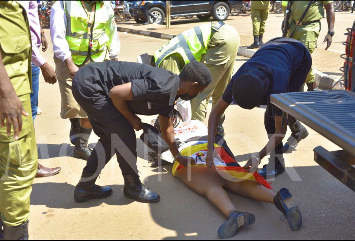HustleKing01's tweet photo. Instead of undressing our mothers, undress the corrupt! Shame on you Uganda police 
#MarchToParliament #StopCorruption https://t.co/pHfBvRz5Cj