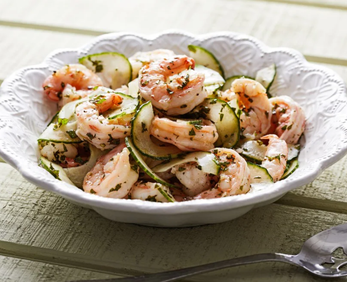 This refreshing &amp; healthful #ShrimpSalad w/ Lime &amp; #Mint Dressing is just the thing to satisfy your appetite while keeping you cool on a hot summer day. Made w/ #cucumber slices + pesto-like dressing, it’s as beautiful as it is tasty &amp; simple to make. tinyurl.com/4r7rdxvr