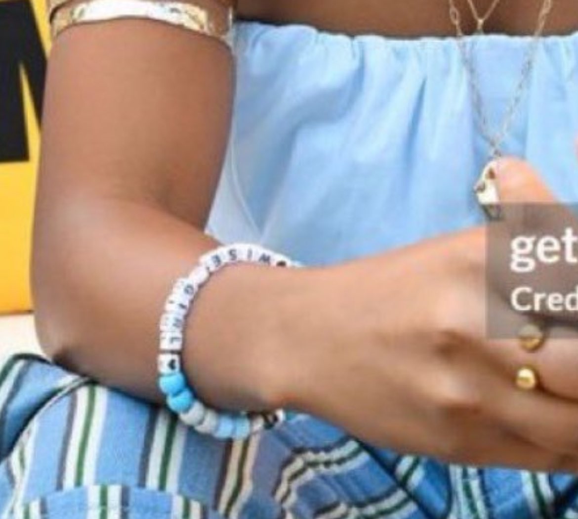 fictionalxmoon's tweet image. their matching bracelets say seaweed brain and wise girl.