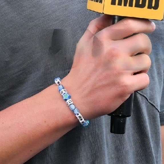 fictionalxmoon's tweet image. their matching bracelets say seaweed brain and wise girl.