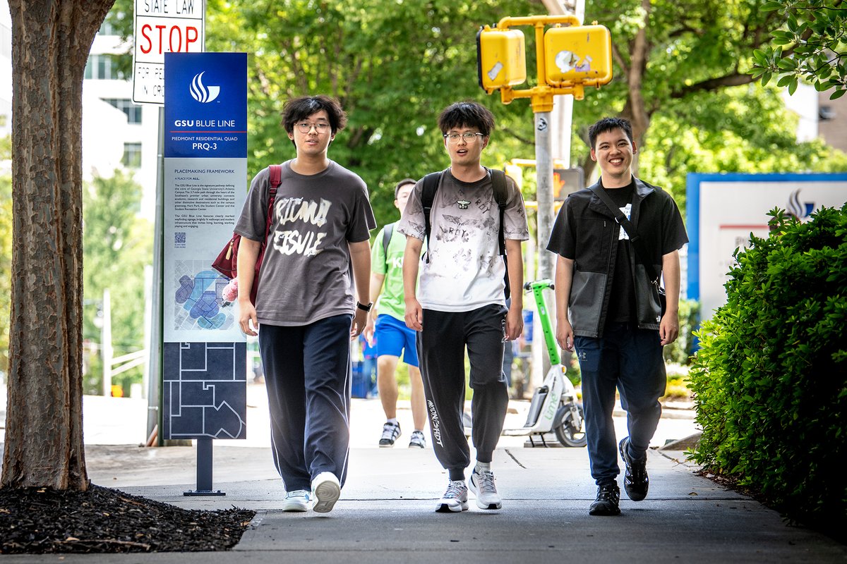 GeorgiaStateU's tweet photo. Something BIG is coming to GSU! A 3.7-mile walking path through campus will connect academic and residential buildings. The #GSUBlueLine features marked signage, lit walkways and new infrastructure that creates a safe place for all. That's #TheStateWay! https://t.co/mriBX1mPcl https://t.co/EsZgf8QGH5
