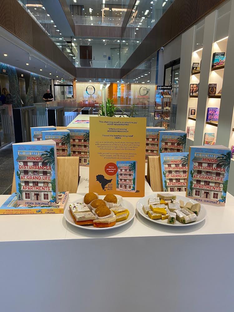 Diana Beaumont (@diana_beaumont) on Twitter photo Lovely to see this tempting display - MINOR DISTURBANCES AT GRAND LIFE APARTMENTS by <a href="/hema_sukumar/">Hema Sukumar</a> (published by <a href="/CoronetBooks/">Coronet</a> <a href="/29jackson/">Hannah Black</a> <a href="/HodderBooks/">Hodder & Stoughton (no longer active)</a>) and sweet treats in honour of South Asian Heritage Month. Thank you <a href="/tomatkins1/">Tom Atkins</a> for arranging it. Lovely to see this tempting display - MINOR DISTURBANCES AT GRAND LIFE APARTMENTS by <a href="/hema_sukumar/">Hema Sukumar</a> (published by <a href="/CoronetBooks/">Coronet</a> <a href="/29jackson/">Hannah Black</a> <a href="/HodderBooks/">Hodder & Stoughton (no longer active)</a>) and sweet treats in honour of South Asian Heritage Month. Thank you <a href="/tomatkins1/">Tom Atkins</a> for arranging it.