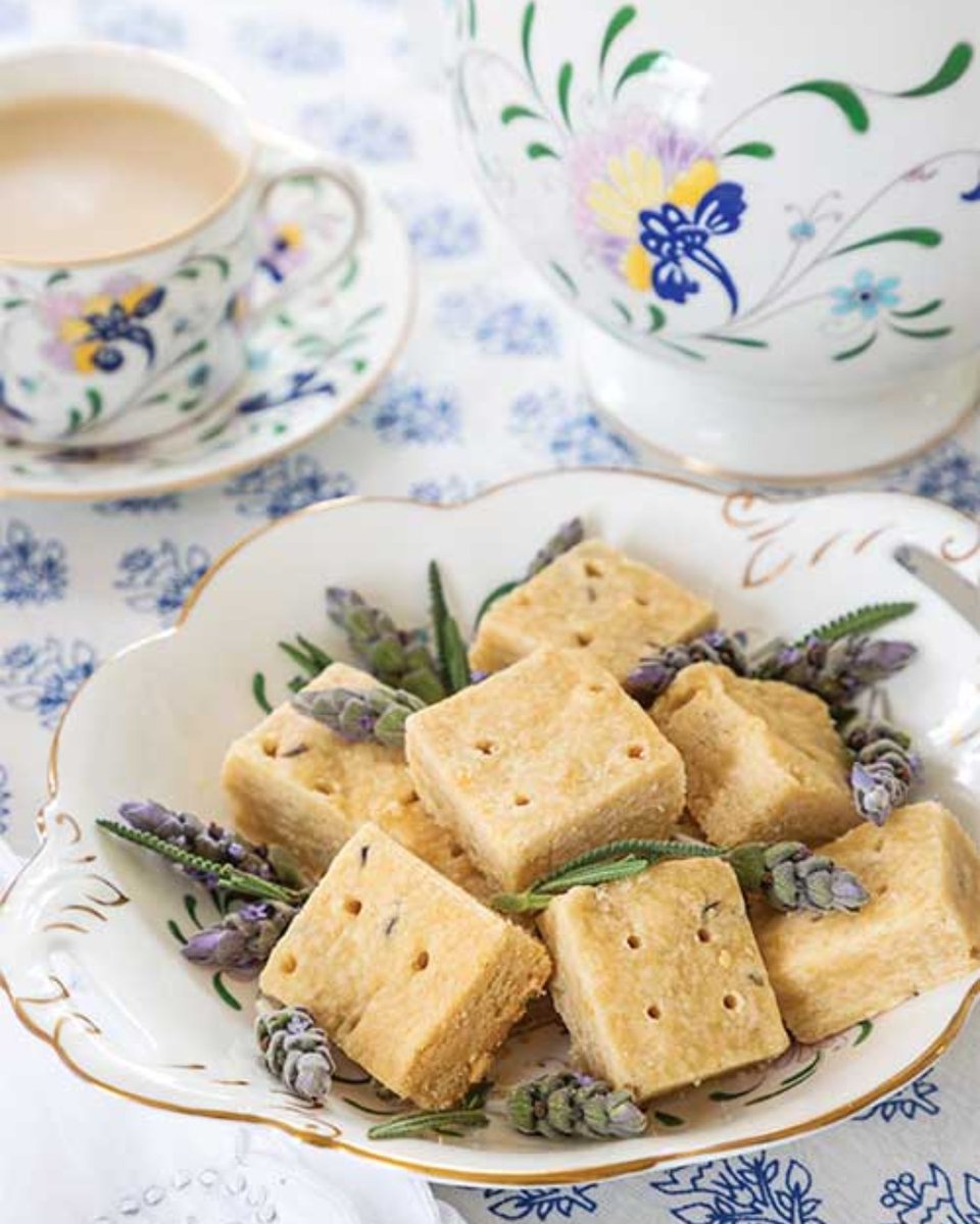 Our relaxing, blue-hued Midsummer Teatime features a menu including scrumptious Blueberry-Ginger Tartlets and Lemon-Lavender Shortbread. Find the recipes for these delectable treats by visiting bit.ly/3Wl4Slo.