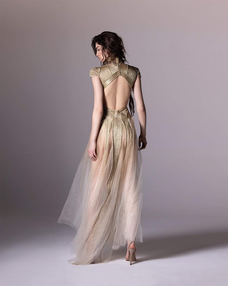 leeloo7z's tweet photo. Look XXVIII: This gilded armor-inspired bodice exudes strength and poise, while the sheer ankle-length skirt, a canvas for the sun ray gold hand-threading, radiates sensuality.
 
#HASSIDRISS #UntitledCreation2024 #LookBook #GoldDress #Embroidery #Threadwork

@HASSIDRISS_ https://t.co/Y2nZDRogCB