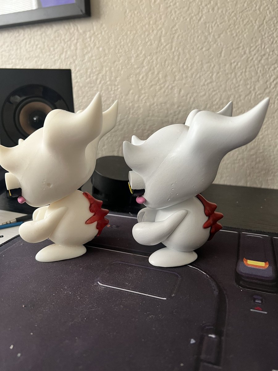 White resin+clear red spine or painted white+painted red spine. Which one better ?