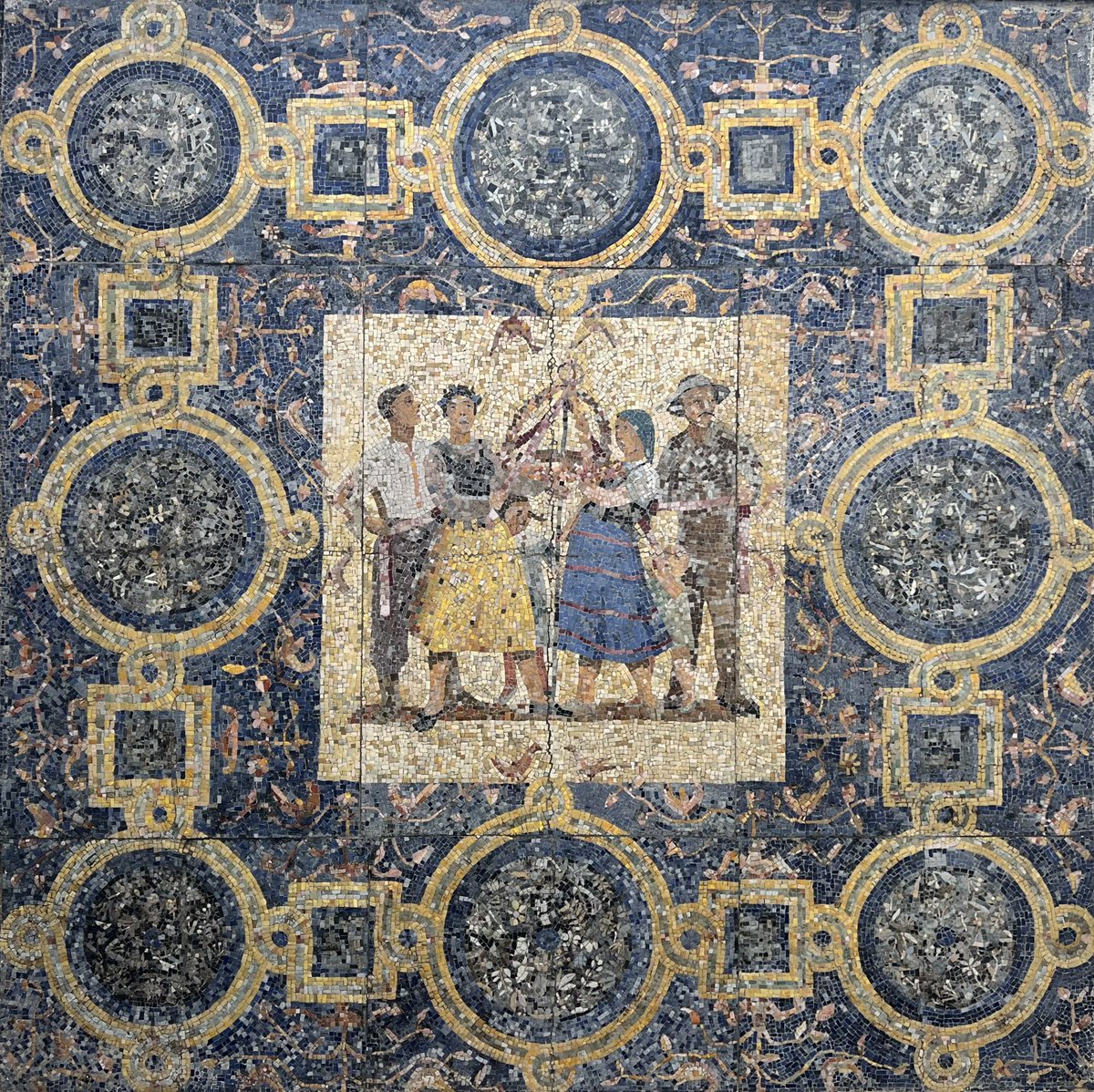 gmoult's tweet photo. socialist realist mosaics in warsaw’s constitution square https://t.co/TiybxML33P