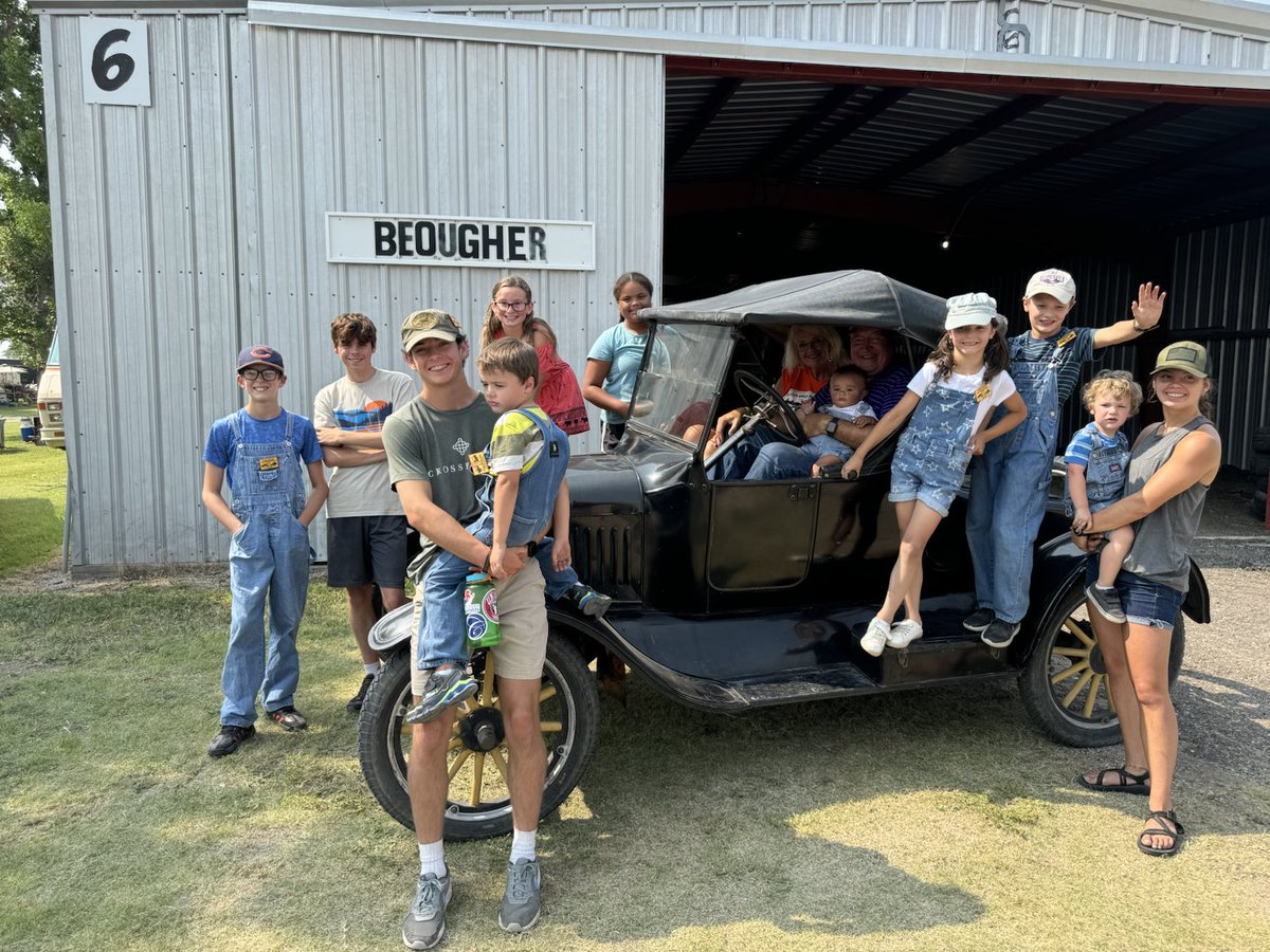 tbeougher's tweet image. My 1925 Model T fired right up again like it has done for 99 years. Sharon and I celebrating with grandkids.