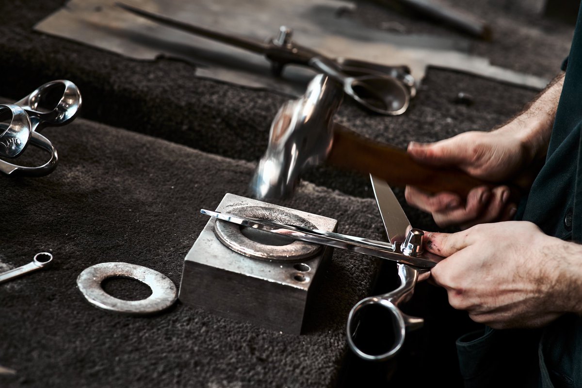 Some people are surprised to learn we marry scissors or shears together like this, using a hammer to adjust the relation of the blades.
It's testament to the putters' delicate touch, and to the hardness of the scissors and shears, that this approach is possible.
