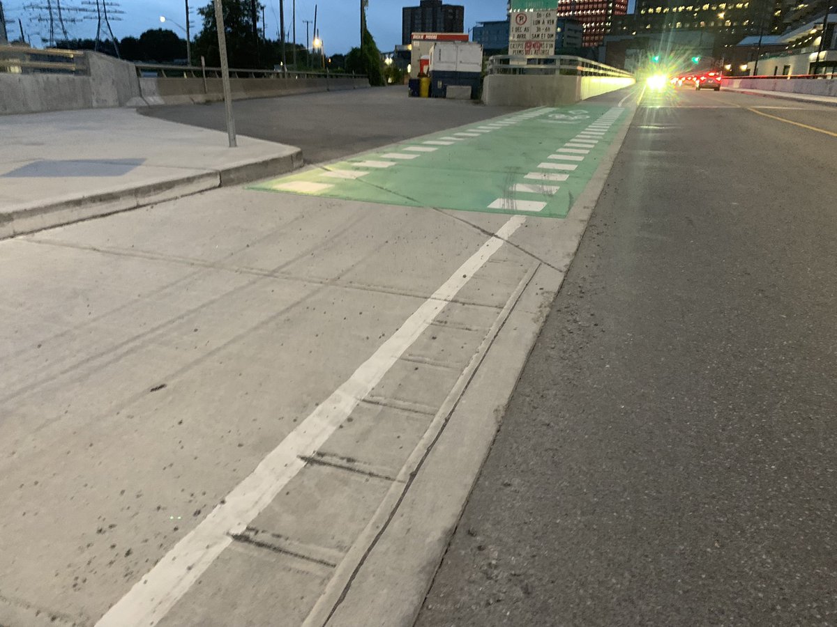 WVangeest's tweet image. I also remember discussion of this entrance to whatever’s over to the side. @PSPC_SPAC was suuuuuper concerned there might be a wee little bump for their poor big trucks, so I’m glad they lowered as much #VéloGat facility as conceivably possible to mitigate that. /s