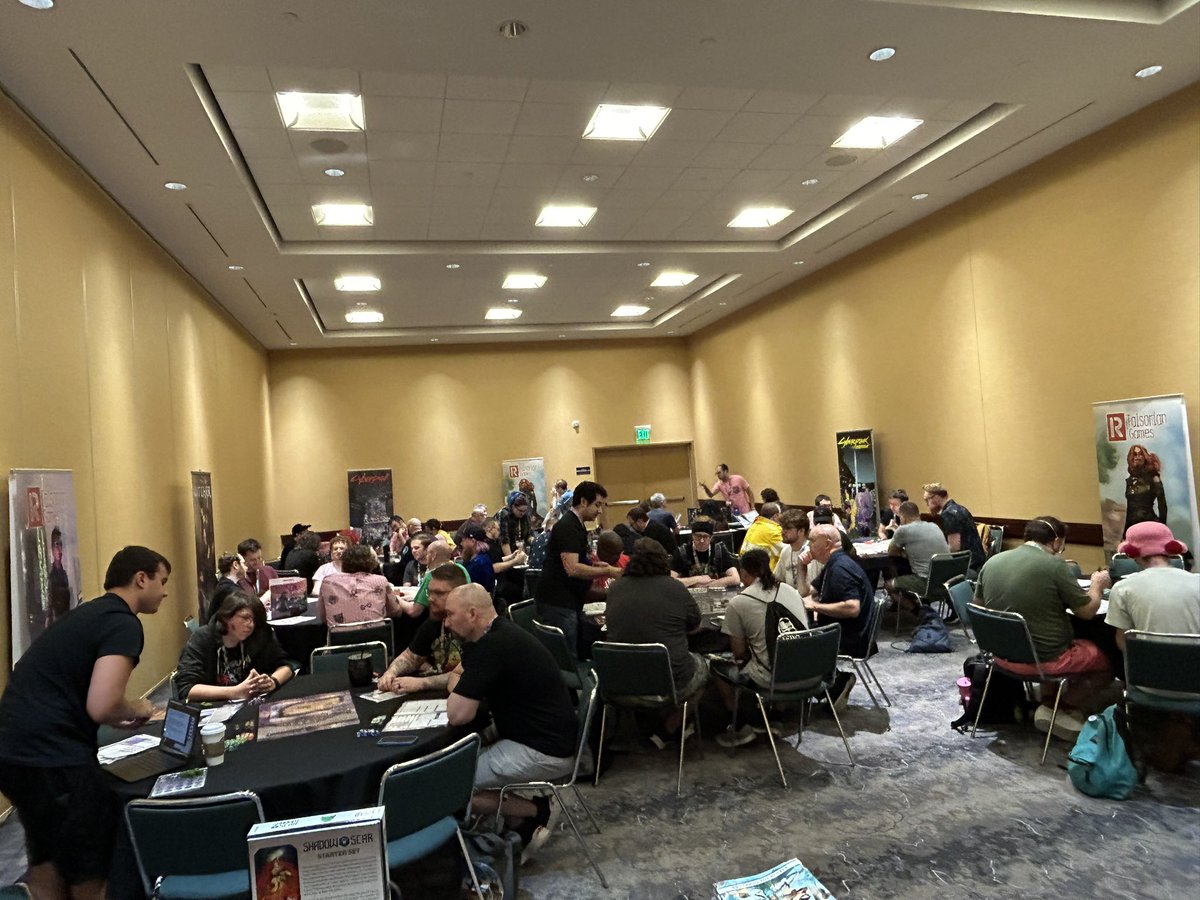 TSH_Emmerron's tweet photo. Helping run @RTalsorianGames game room has been a blast so far! If you want to try #ShadowScar, #cyberpunkred, or the upcoming #FossilizedViolence, come check us out in ICC 143! https://t.co/LxJ7EaSO8m