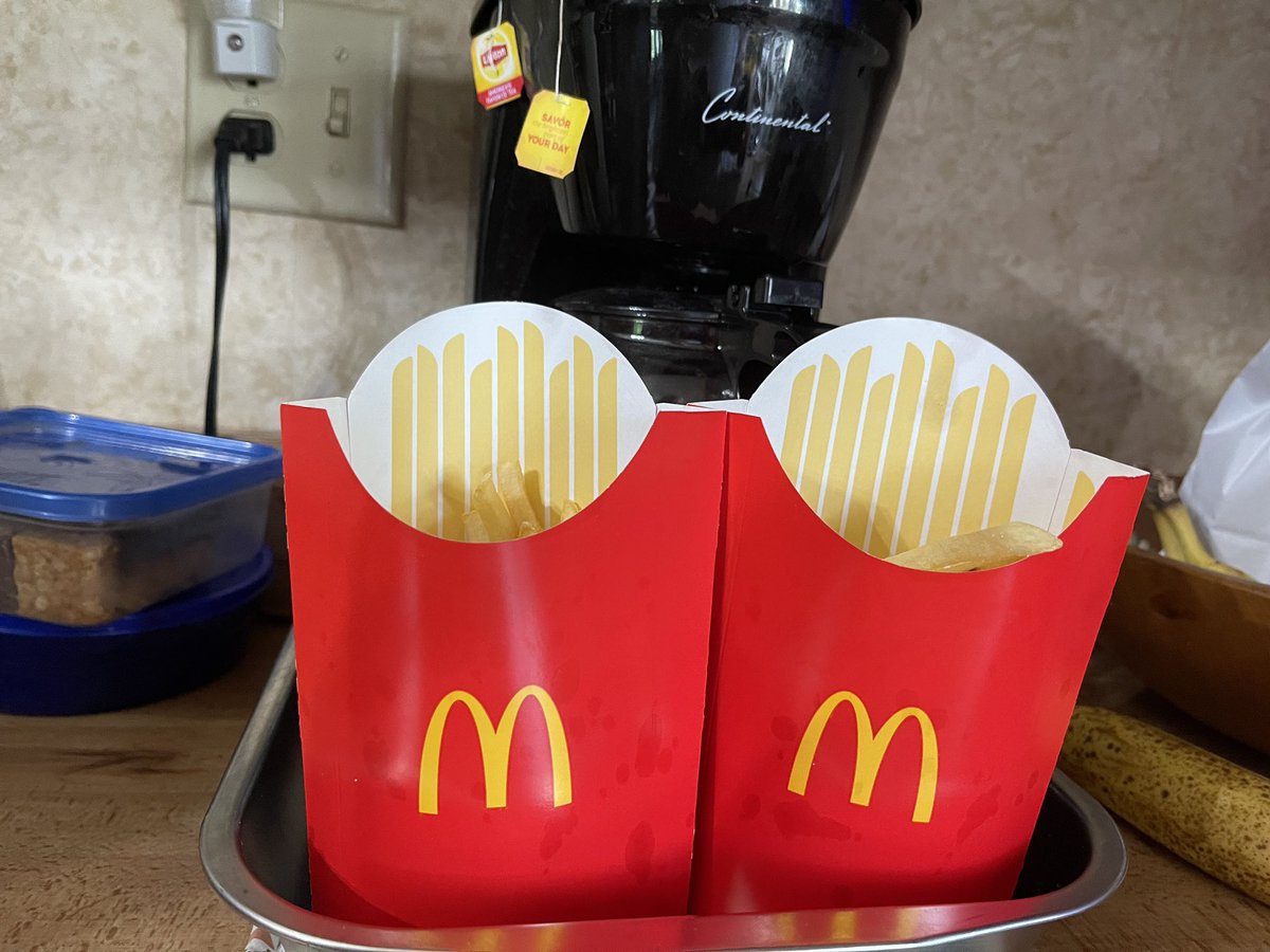 redoctober25's tweet photo. @McDonalds look… I know that these are run by Franchise Owners… but there needs to be a standard of quality… I just paid $4 each (plus tax) for 2 LARGE Fries… it barely looks like enough for a Medium (more likely a Small).  Seriously, please tell your Franchises to do better. https://t.co/bisHauHOM2