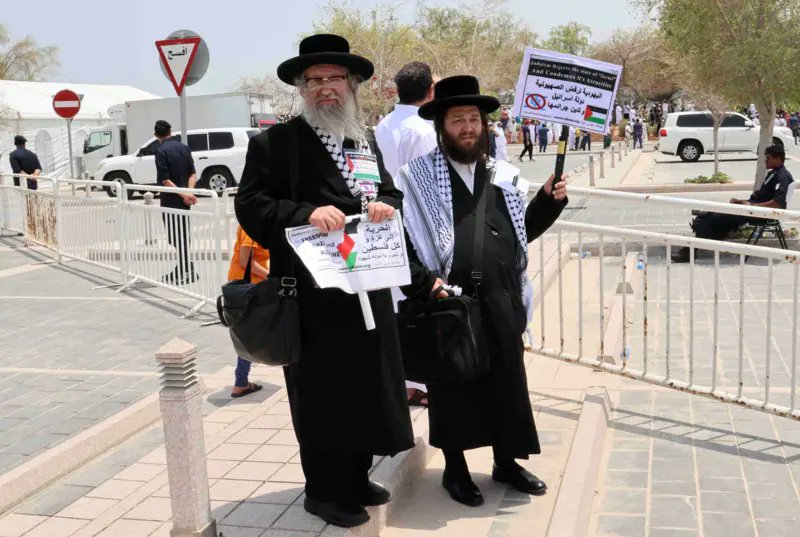 voiceofrabbis's tweet photo. Anti-Zionist Jewish Rabbis arrived to Qatar to participate in the funeral procession of Hamas political bureau chief Ismail Haniyeh 

They raised a banner reading "Jews are not Zionists." https://t.co/8h4cR1L4ye