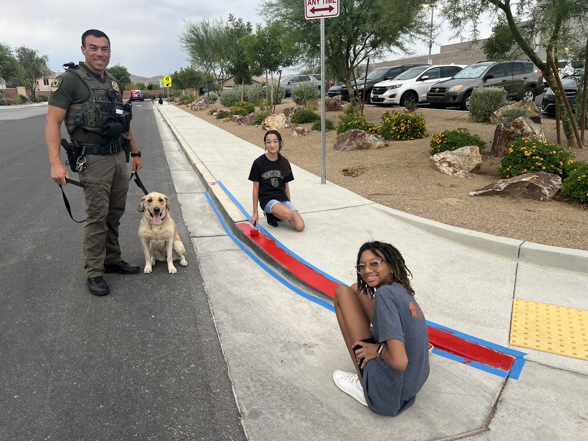 lindemuthccsd's tweet photo. It was an amazing morning at #GundersonMiddleSchool. #CCSDPD Officers, Clark County, GMS staff, GMS students, and GMS parents came out to paint our curbs red and help with the safety around Gunderson. A very special thank you to Lieutenant Campbell, @AndrewBennettNV, Erin Breen, https://t.co/wXLo4vXTT9