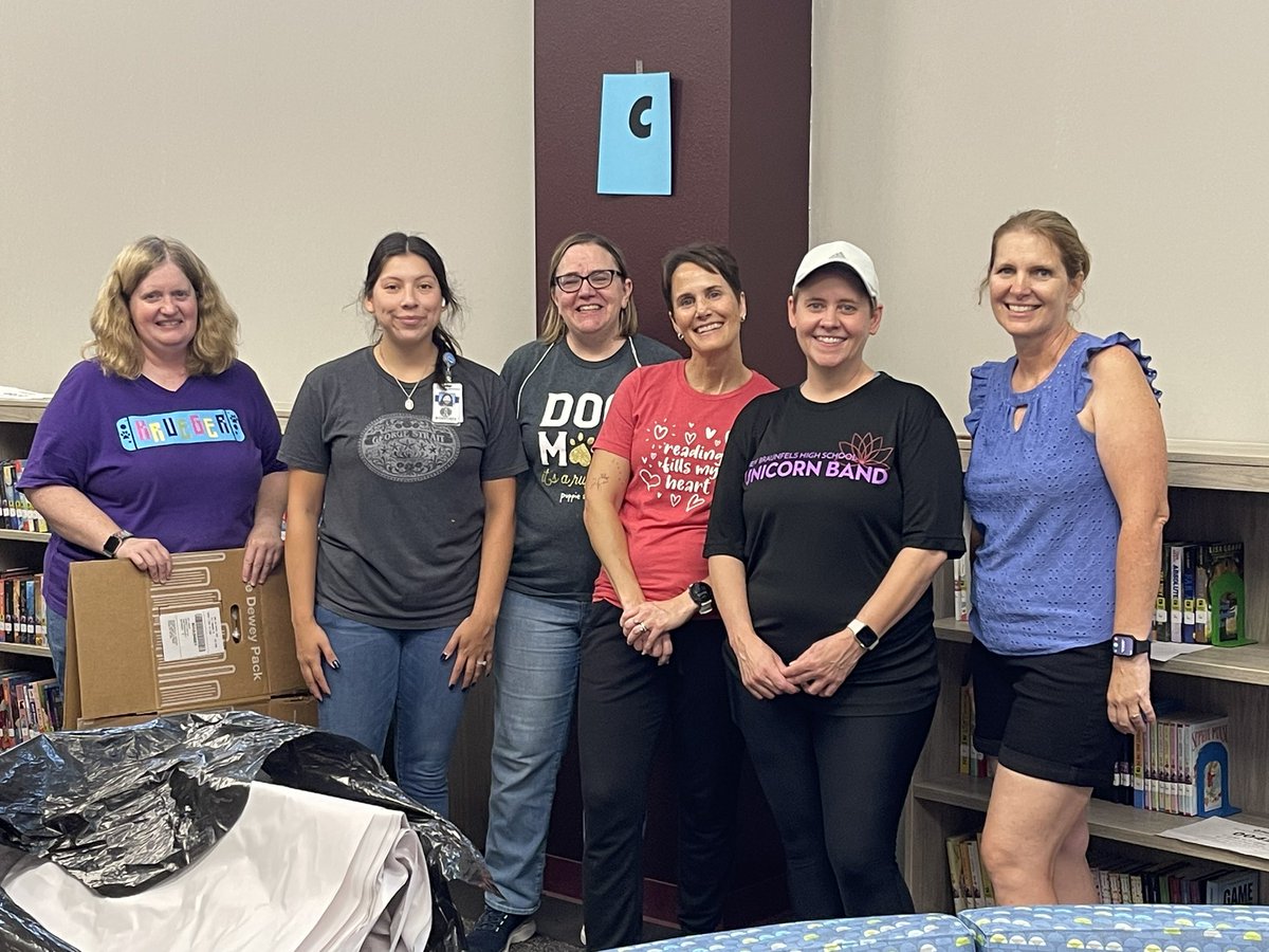 GREAT morning putting up books with Chumbley ES Librarian, Kelly Torres &amp; fellow NISD Librarians from Krueger, Aue &amp; more. Thank you Jennifer with Lib Svcs.  Blessed to be in a District that embraces Librarians &amp; the gift they give to our children…a love of reading. <a href="/NISD/">Northside ISD</a>