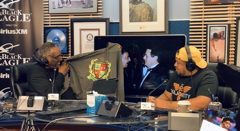 UrbanViewRadio's tweet photo. .@AfricanaCarr received a T-shirt from @MrLamontKing. @MrLamontKing explains the meaning behind each symbol. Tune in to Chanel 126 and on SiriusXM app search 🔍 Urban View Mornings. 

#SiriusXM https://t.co/KGNoFHA6NW