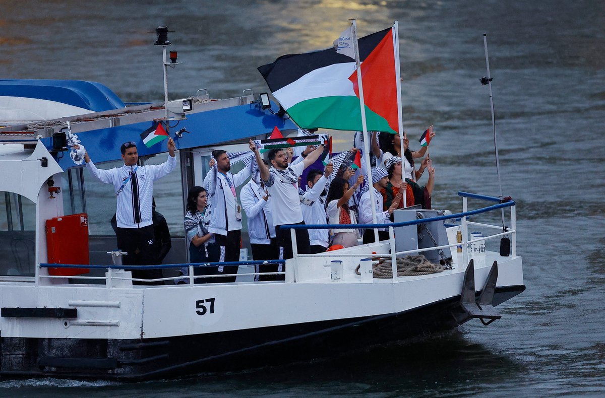 The Palestinian athletes have just made their entry into the #Paris2024 Olympic Games on a boat in the River Seine.

🔵 LIVE updates: aje.io/9uwr4e