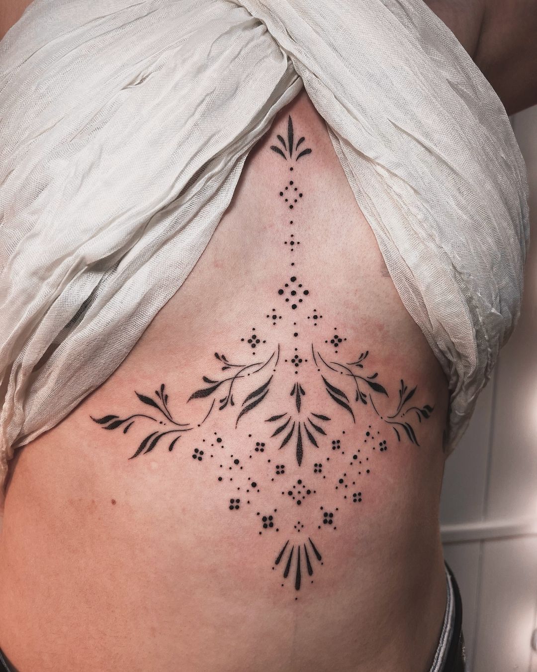 Ornamental Sternum Tattoos