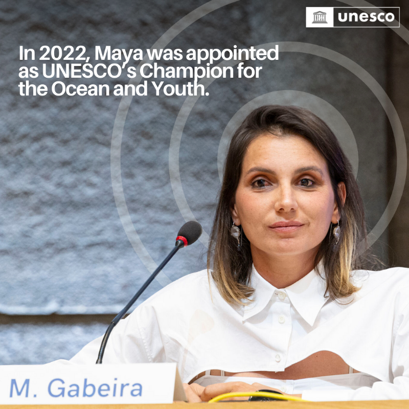 UNESCO's tweet photo. @UNESCO's Champion for the Ocean and Youth, @MayaGabeira, has not only conquered enormous waves but also set numerous world records, inspiring a new generation of surfers.

Maya continues to #ChangeTheGame! 🏄‍♀️