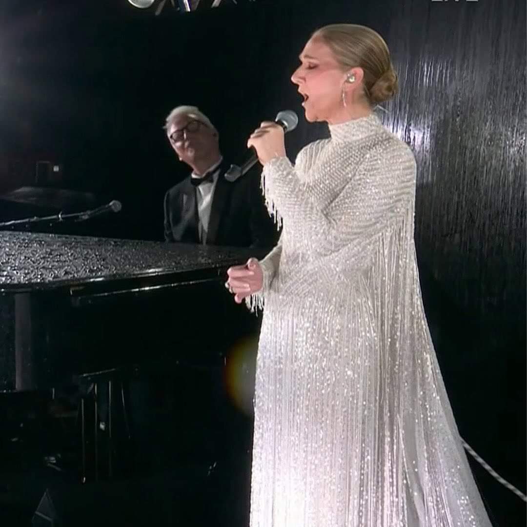 karmini07's tweet photo. Best part of the Opening ceremony was listening to the insanely talented @celinedion  sing. What a voice and what a comeback! You'd never know she went through what she did, health wise.  Amazing! Give her a gold medal! #Paris2024    #goldforceline https://t.co/rJ9RVJUCA4