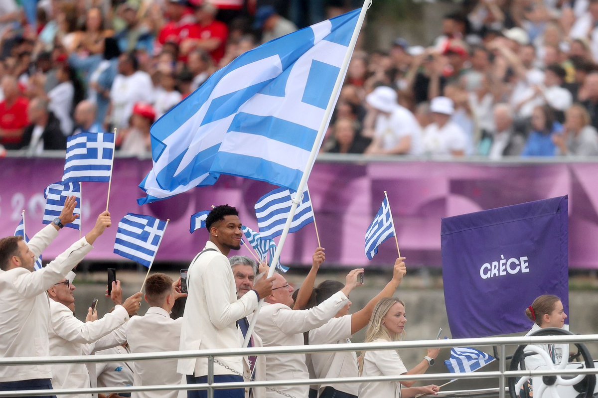 NBA's tweet photo. LeBron James, Dennis Schroder, and Giannis Antetokounmpo represent their countries as flag bearers in the #Paris2024 Opening Ceremony! https://t.co/HWjxXK1wyW