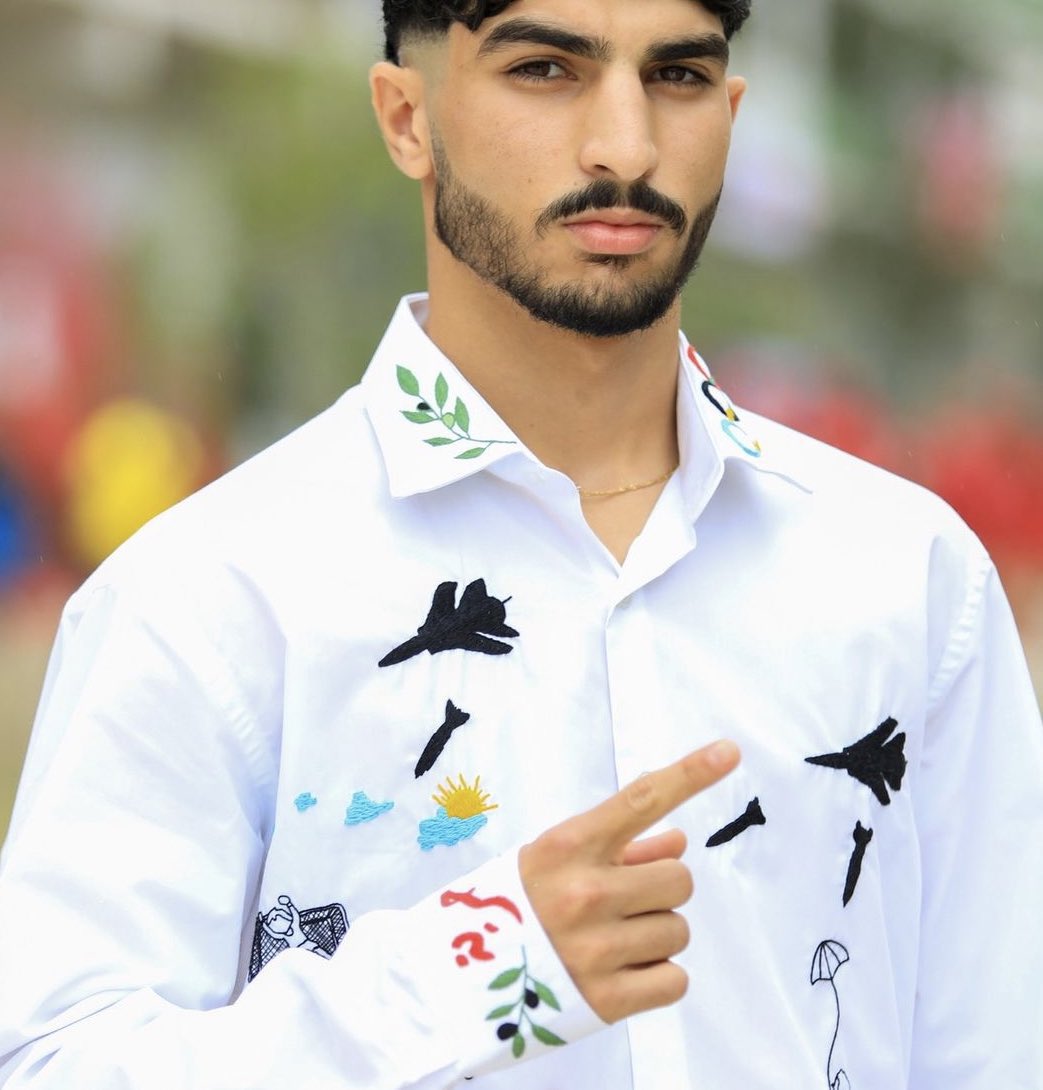 comculturaearte's tweet photo. Detalhes da camisa usada pelo porta-estandarte da Palestina, o pugilista Waseem Abu Sal, na cerimónia de abertura da 33.ª edição dos Jogos Olímpicos de Paris, França. https://t.co/vNg1Dut4wB