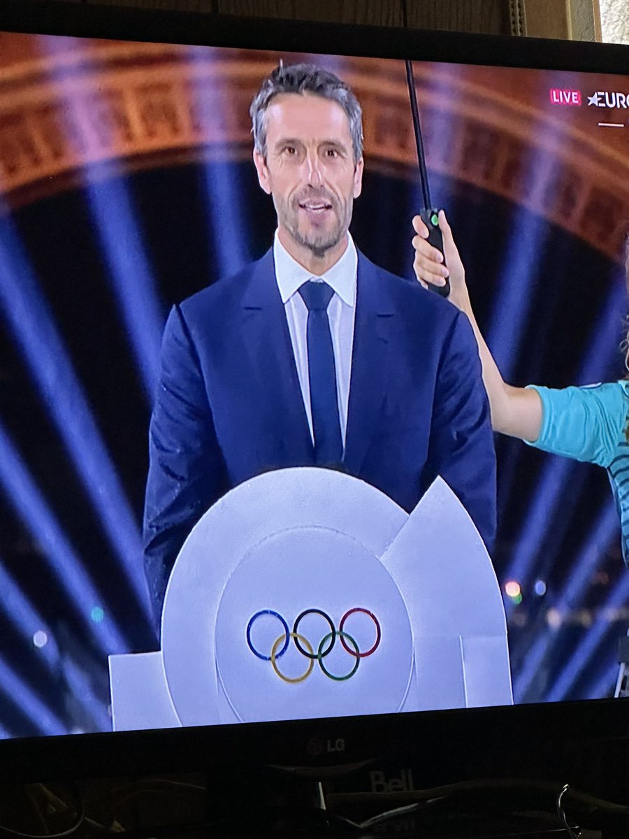 Light the torch already… this guy’s going on like everyone’s got a personal umbrella handler with them #Olympic2024