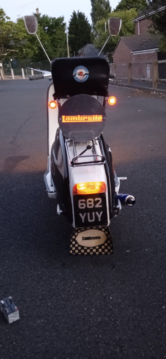 Couple of auxiliary lights on my Lambretta, along with a one off custom made illuminated Lambretta aluminium plate