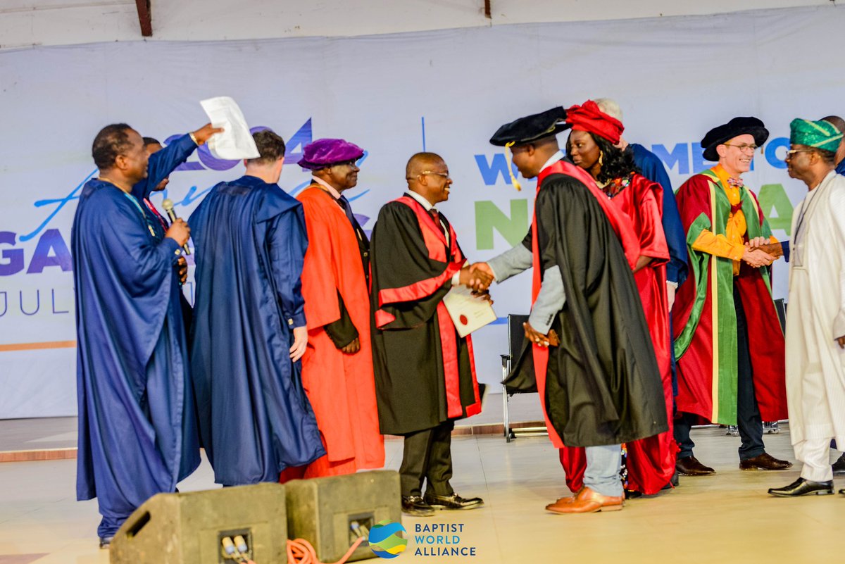 BaptistWorld's tweet photo. July 10, 2024, was a memorable day as Uzoma Uzoeshi was awarded his PhD from University of Divinity, Victoria Melbourne, Australia in the presence of the Global Baptist family during the fellowship with the Nigerian Baptist family. Congrats Rev. Dr. Uzoma!
#BWAlagos #BaptistWorld https://t.co/CLC2t8tnUS