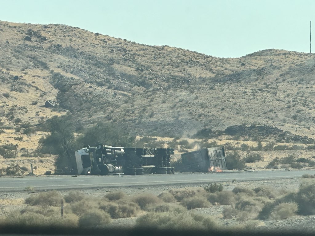 ArtParmann's tweet photo. Anyone stuck northbound on #i15 I-15…you should just turn back. 

Fire is burning hot still and fire fighters have tents up. It’s not opening any time soon. Looks like they are just gonna let it burn out. 

( We just got through on the south bound I15…) https://t.co/Cu8PU9uubz