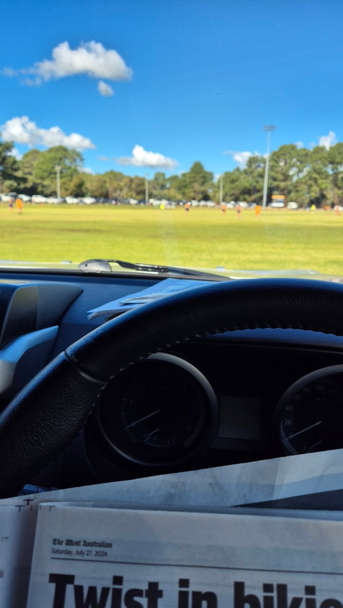 Watching junior footy, currently Colts playing, while reading the paper. Great catch up with friends while eating a sweet chilli chicken wrap from the Kay Lomax kitchen at the Gibbo footy ground. Plus a coffee from the coffee van. Very civilised for a country town!