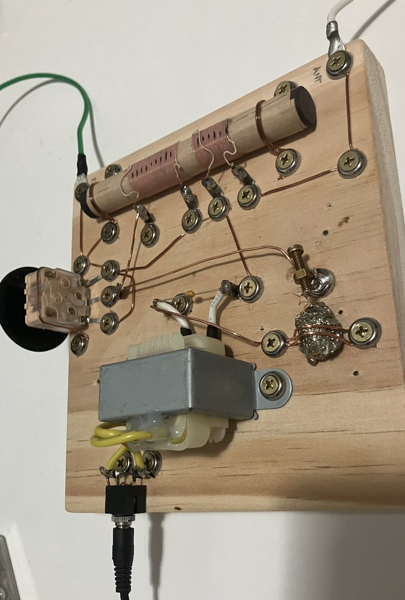 A “real” crystal radio. With a rock.

This is temperamental and insensitive - but it’s working. This is pyrite, galena also works.

An active semiconducting device- and it’s a rock.

Excuse the messy soldering to the brass, I don’t have the ideal iron and flux here at the moment.