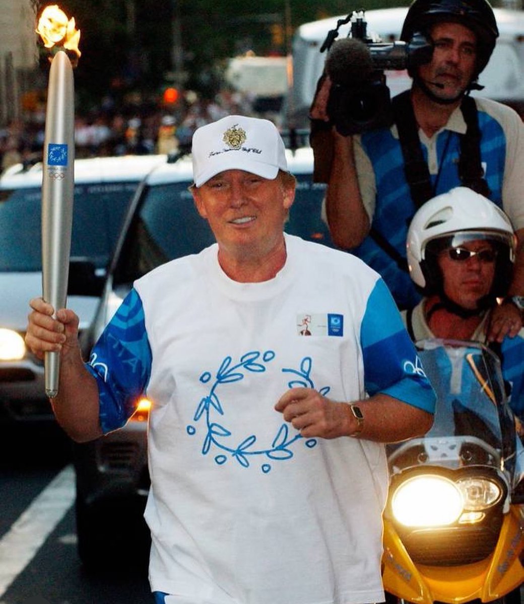 Donald Trump carrying the Olympic torch, 2004