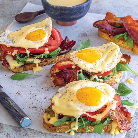 summer_food's tweet photo. BLT Fried Eggs Benedict sounds like a fantastic fusion of classic flavors with a brunch twist! Here’s how you can make it:

Ingredients

Meat:
- 8 slices thick-cut bacon

Produce:
- 1 bunch fresh arugula
- 2 medium tomatoes

Refrigerated:
- 5 large egg yolks
- 4 large eggs

Condiments:
- 1 easy hollandaise sauce (store-bought or homemade)
- 2 tbsp fresh lemon juice

Baking & Spices:
- 1/2 tsp kosher salt
- 1/8 tsp paprika
- 1/4 tsp ground red pepper

Bread & Baked Goods:
- 4 slices whole-grain bread

Dairy:
- 1 cup unsalted butter

 Instructions

 1. Cook the Bacon:
1. In a large skillet over medium heat, cook the bacon slices until crispy, about 6-8 minutes, turning occasionally.
2. Remove the bacon and place it on paper towels to drain excess fat. Set aside.

 2. Prepare the Hollandaise Sauce:
1. If using store-bought hollandaise sauce: Heat it gently in a saucepan over low heat or follow the package instructions.
2. For homemade hollandaise sauce:
   - In a heatproof bowl over a pot of simmering water (double boiler), whisk together 5 egg yolks and 2 tbsp lemon juice.
   - Gradually add 1 cup melted unsalted butter while whisking continuously until the sauce thickens.
   - Season with kosher salt and red pepper to taste.

 3. Prepare the Vegetables:
1. Slice the tomatoes into medium rounds.
2. Wash and dry the arugula.

 4. Toast the Bread:
1. Toast the whole-grain bread slices in a toaster or on a skillet until golden brown.

5. Cook the Eggs:
1. Fried Eggs:
   - Heat a small amount of butter in a non-stick skillet over medium heat.
   - Crack the eggs into the skillet and cook until the whites are set and the yolks are cooked to your liking (sunny-side up or over-easy).

6. Assemble the Sandwiches:
1. Spread a layer of hollandaise sauce on each slice of toasted bread.
2. Layer on the arugula, tomato slices, and bacon.
3. Top each sandwich with a fried egg.

7. Garnish and Serve:
1. Season with kosher salt, paprika, and ground red pepper as desired.
2. Optionally, drizzle a bit more hollandaise sauce over the top.
3. Serve immediately while warm.

Tips:
- For extra flavor: You can add a dash of hot sauce to the hollandaise sauce or sprinkle fresh herbs like chives or parsley on top.
- For a crispier texture: Ensure the bacon is well-drained and crispy before layering it on the bread.

This BLT Fried Eggs Benedict combines the richness of hollandaise with crispy bacon, fresh arugula, juicy tomatoes, and a perfectly fried egg—making it a decadent and delicious choice for brunch! Enjoy!