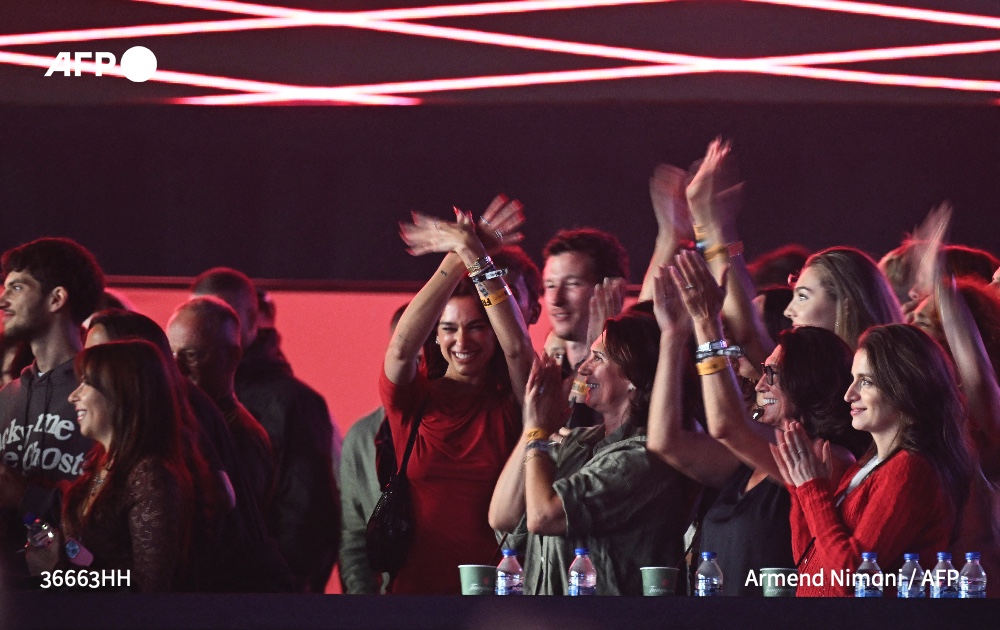 AFP's tweet image. 🎤 🇽🇰 The Sunny Hill festival in Pristina is helping turn Kosovo into a go-to destination during Europe's summer festival season from being associated with its bloody war against Serbia, thanks in large part to its founder: Dua Lipa. 
Read more: u.afp.com/5B7H