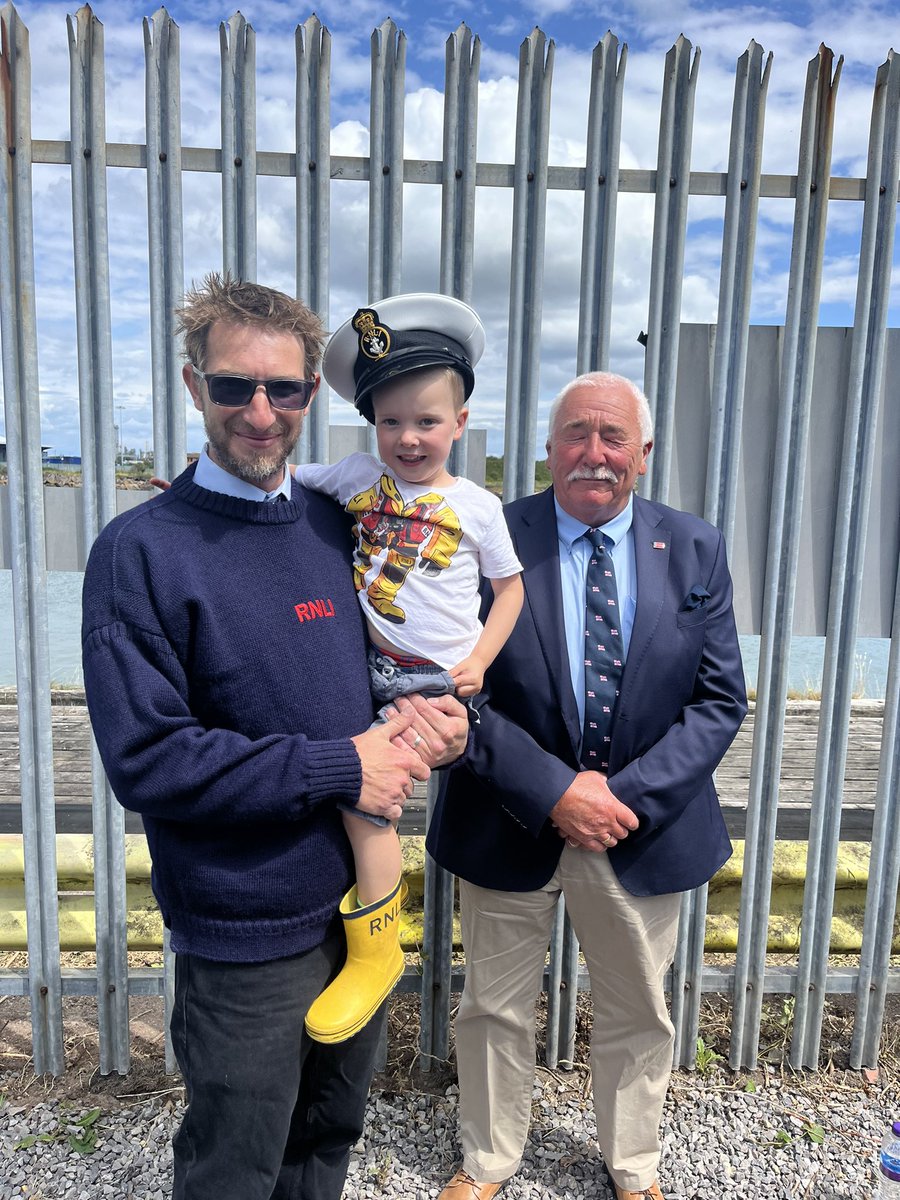 Two generations of RNLI lifeboat crew and one just waiting to join the legacy following in daddy and gramps footsteps <a href="/RNLIBarrydock/">Barry Dock Lifeboat</a>  <a href="/RNLI/">RNLI</a> official opening of the new Barry dock lifeboat station ⚓️