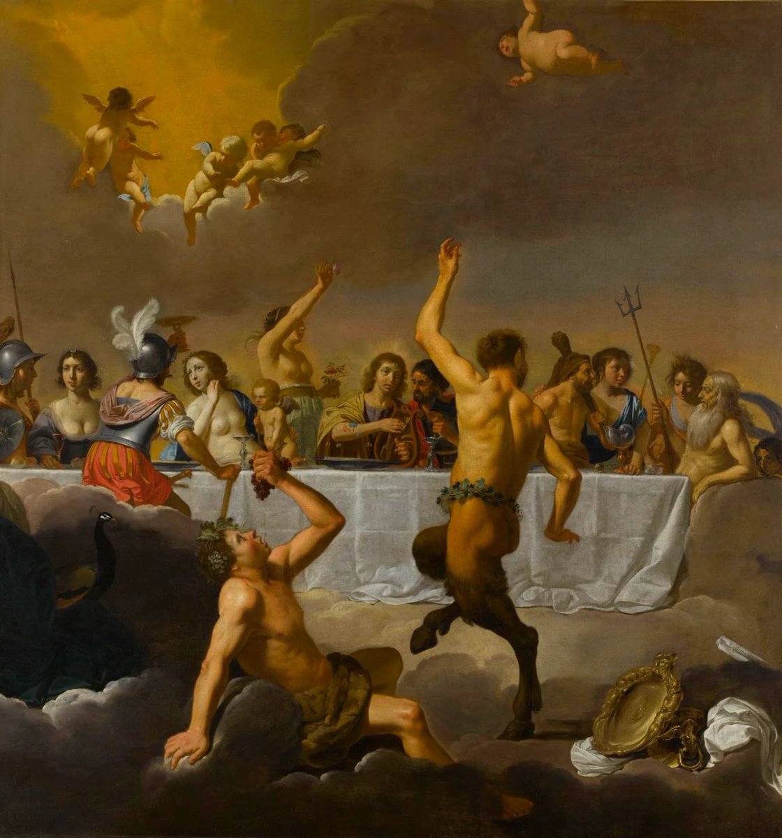 Op de #OpeningCeremony van #Paris2024 werd een tableau vivant (een levend schilderij) getoond van 'Het Feest van de Goden' van Jan van Bijlert uit 1635 (bewaard in het museum in Dijon). Apollo, de Zonnegod, is herkenbaar aan de stralenkrans, Bacchus aan de druiven op zijn hoofd.