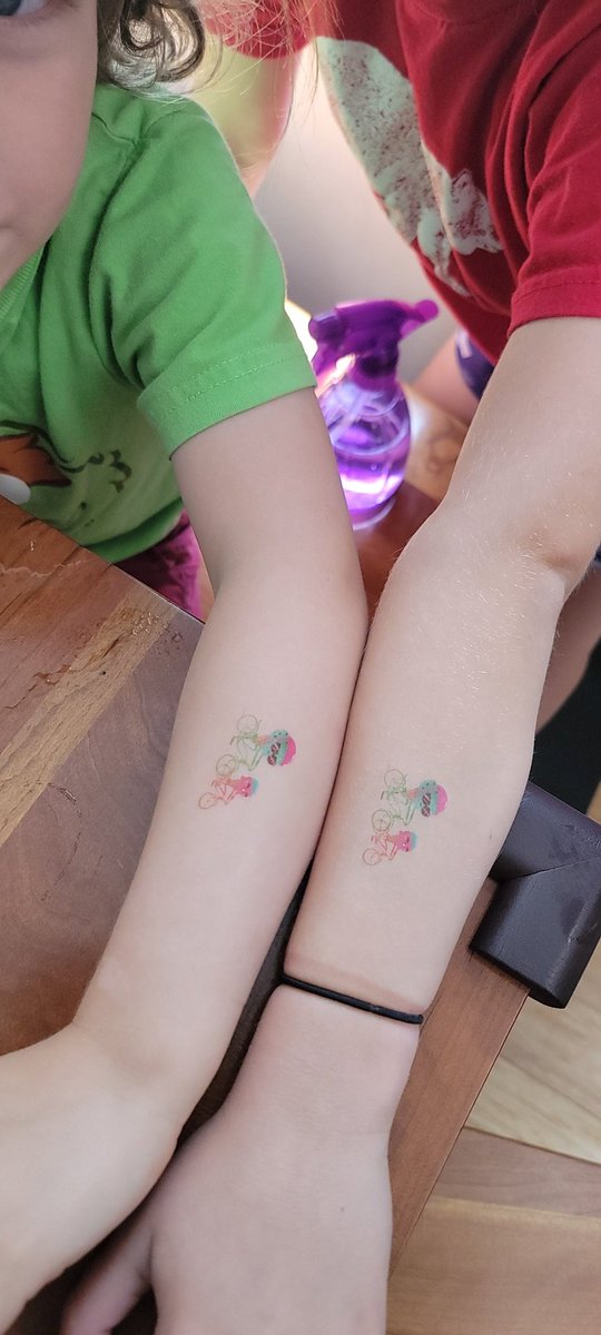 Our testers agreed to try out our new temporary tattoos of our ice cream cone bike riders.   familybikeride.org/summer