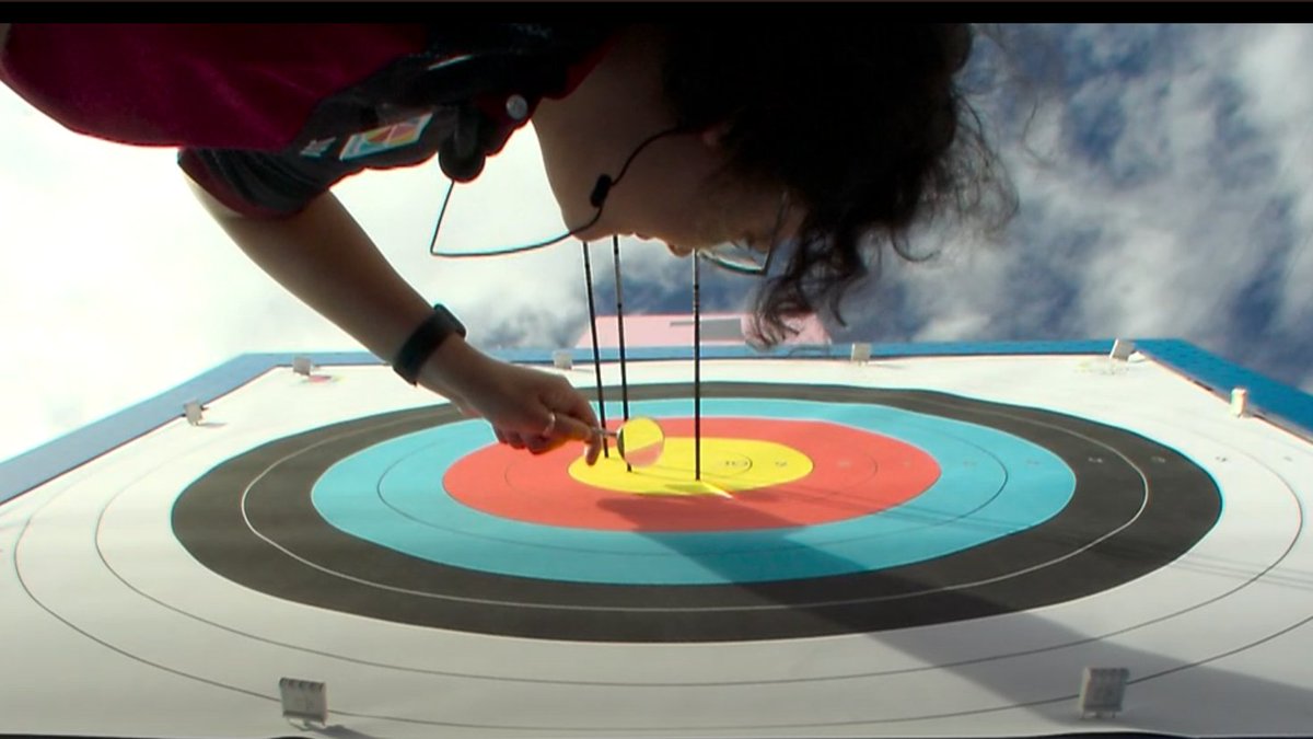 rodger's tweet image. the gold medal archery match came down to a one-arrow shoot-off AND THEN it came down to an arrow so close to the border between a 9 and a 10 that someone had to come out and look at it with a magnifying glass. unreal drama